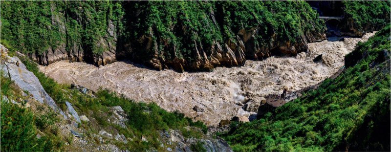 感受虎跳峡谷里的村寨风情文化